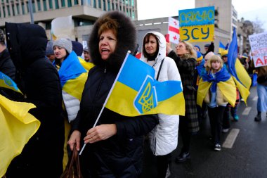 Several thousand people take part in a demonstration for the first anniversary of the Russian invasion in Brussels, Belgium on Feb. 25, 2023.