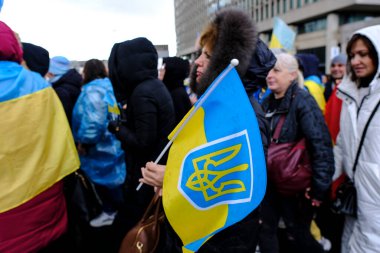 Several thousand people take part in a demonstration for the first anniversary of the Russian invasion in Brussels, Belgium on Feb. 25, 2023.