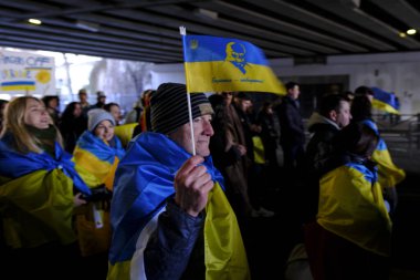 Several thousand people take part in a demonstration for the first anniversary of the Russian invasion in Brussels, Belgium on Feb. 25, 2023.