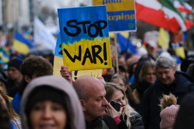 Several thousand people take part in a demonstration for the first anniversary of the Russian invasion in Brussels, Belgium on Feb. 25, 2023.