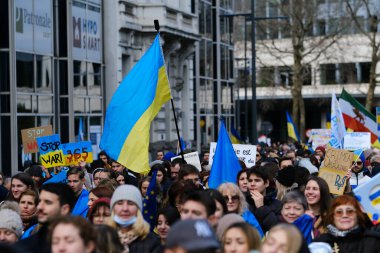 Several thousand people take part in a demonstration for the first anniversary of the Russian invasion in Brussels, Belgium on Feb. 25, 2023.
