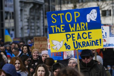 Several thousand people take part in a demonstration for the first anniversary of the Russian invasion in Brussels, Belgium on Feb. 25, 2023.