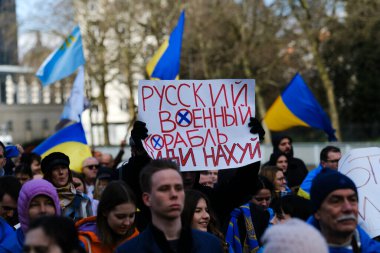 Several thousand people take part in a demonstration for the first anniversary of the Russian invasion in Brussels, Belgium on Feb. 25, 2023.