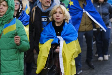 Several thousand people take part in a demonstration for the first anniversary of the Russian invasion in Brussels, Belgium on Feb. 25, 2023.