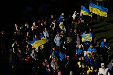 Several thousand people take part in a demonstration for the first anniversary of the Russian invasion in Brussels, Belgium on Feb. 25, 2023.