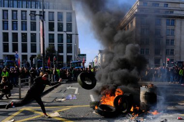Tires are burning during a protest of farmers from Belgium's northern region of Flanders, against a new regional government plan to limit nitrogen emissions, in Brussels, Belgium March 3, 2023.