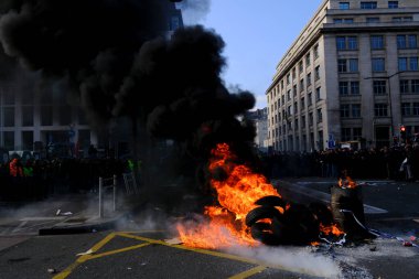 Tires are burning during a protest of farmers from Belgium's northern region of Flanders, against a new regional government plan to limit nitrogen emissions, in Brussels, Belgium March 3, 2023.
