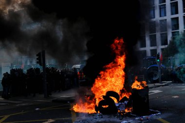 Tires are burning during a protest of farmers from Belgium's northern region of Flanders, against a new regional government plan to limit nitrogen emissions, in Brussels, Belgium March 3, 2023.