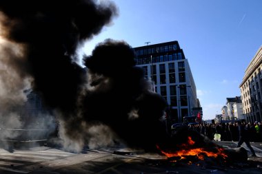 Tires are burning during a protest of farmers from Belgium's northern region of Flanders, against a new regional government plan to limit nitrogen emissions, in Brussels, Belgium March 3, 2023.