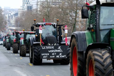 Farmers with their tractors from Belgium's northern region of Flanders take part in a protest against a new regional government plan to limit nitrogen emissions, in Brussels, Belgium on March 3, 2023.