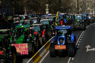 Farmers with their tractors from Belgium's northern region of Flanders take part in a protest against a new regional government plan to limit nitrogen emissions, in Brussels, Belgium on March 3, 2023.