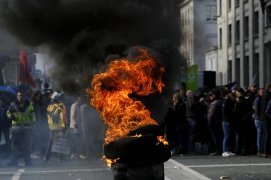 Tires are burning during a protest of farmers from Belgium's northern region of Flanders, against a new regional government plan to limit nitrogen emissions, in Brussels, Belgium March 3, 2023.