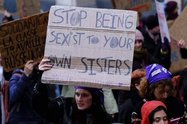 stock image Activists hold placards and chant slogans during a rally to mark the International Women's Day in Brussels, Belgium on March 8, 2023.