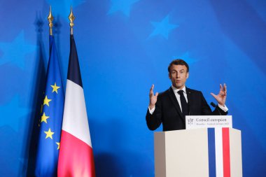 Fransa Cumhurbaşkanı Emmanuel Macron, AB Zirvesi sonrasında 24 Mart 2023 'te Brüksel, Belçika' daki AB genel merkezinde düzenlediği basın toplantısında konuştu..
