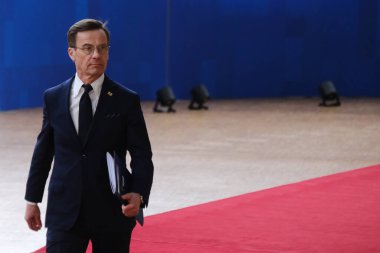 İsveç Başbakanı Ulf Kristersson AB Zirvesi için 23 Mart 'ta Brüksel' deki AB genel merkezine geldi.,
