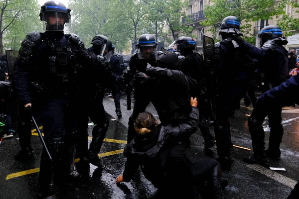 stock image Riot police clashed with protesters during the May Day labour march, a day of mobilisation against the French pension reform law and for social justice, in Paris, France May 1, 2023.