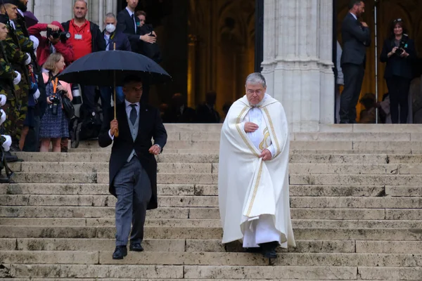 stock image A catholic priest goes down the staircase of Cathedral, Brussels, Belgium on July 21, 2021.