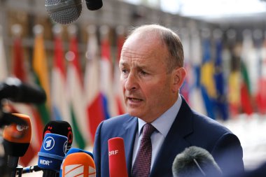 Micheal MARTIN ,Minister for Defence arrives to attend in meeting of EU Defence Ministers at the European Council headquarters in Brussels, Belgium on May 23, 2023. clipart