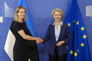 European Commission President Ursula von der Leyen, right, greets Estonia's Prime Minister Kaja Kallas prior to a meeting at EU headquarters in Brussels, Belgium on June 28, 2023. clipart