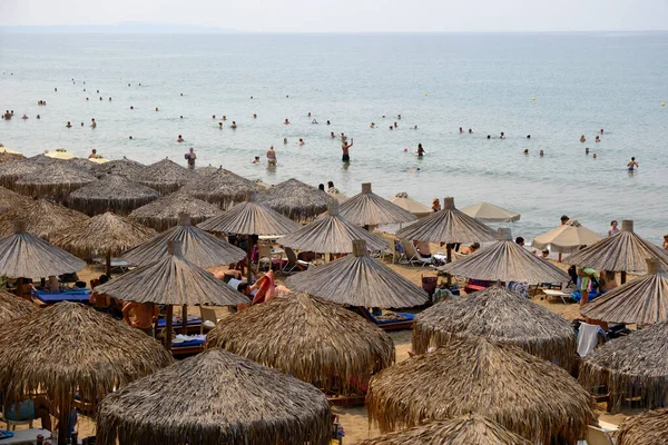 stock image View of a crowded beach in Kourouta, Amaliada, Greece on August 24, 2023.