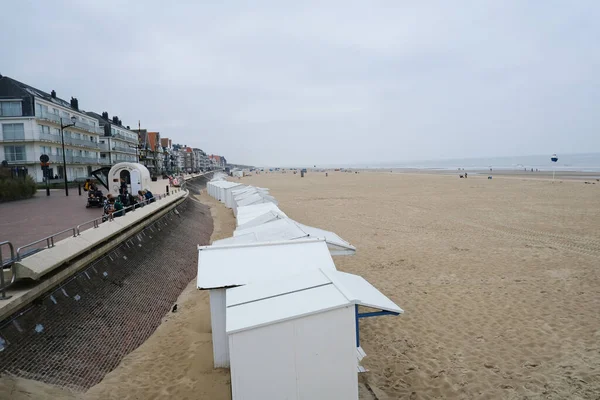 stock image Beach cabins in sandy beach of  De Haan, Belgium on September 17, 2023.