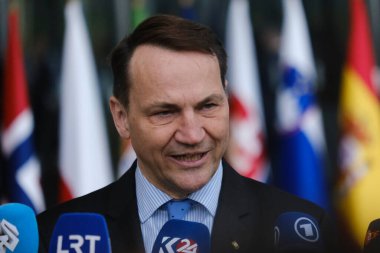 Radoslaw SIKORSKI, Foreign Minister  addresses media during a statement ahead of a NATO foreign ministers meeting at NATO headquarters in Brussels, Belgium on April 3, 2024. clipart