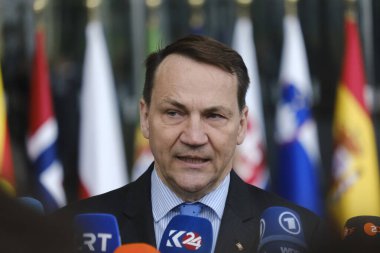 Radoslaw SIKORSKI, Foreign Minister  addresses media during a statement ahead of a NATO foreign ministers meeting at NATO headquarters in Brussels, Belgium on April 3, 2024. clipart