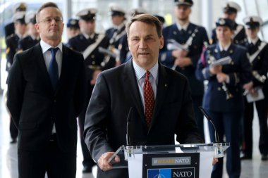 Radoslaw SIKORSKI, Foreign Minister addresses the audience during a ceremony to mark the 75th anniversary of NATO at NATO headquarters in Brussels, Belgium on April 4, 2024. clipart