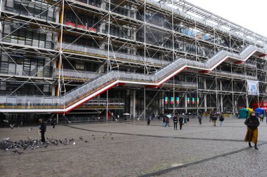 Tourists stroll outside of Centre Pompidou in Paris, France on March 29, 2024. clipart