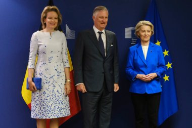 Queen Mathilde, King Philippe of Belgium and EU Commission President Ursula Von der Leyen pose for photo at the start of a royal visit to EU headquarters, in Brussels, Belgium on May 15, 2024. clipart