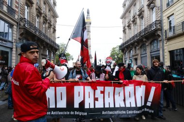 İnsanlar 16 Haziran 2024 'te Brüksel, Belçika' da düzenlenen Radikal Sağ karşıtı bir gösteriye katıldılar.. 