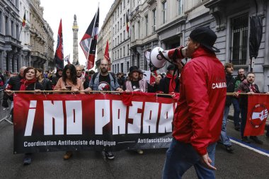 İnsanlar 16 Haziran 2024 'te Brüksel, Belçika' da düzenlenen Radikal Sağ karşıtı bir gösteriye katıldılar.. 
