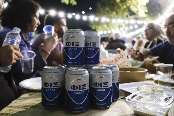 stock image Cans of the greek beer Fix in restaurant in Paloukova village in Greece on July  27, 2024.