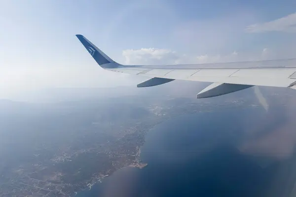 stock image Aegean Airlines Airbus A320 fly over Athens, Greece on September 2, 2024.