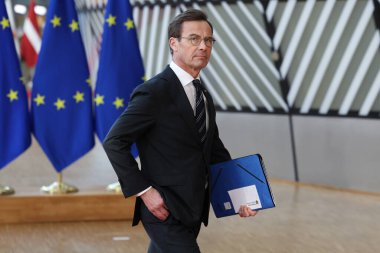 İsveç Başbakanı Ulf Kristersson, 20 Mart 2025 'te Brüksel' deki AB genel merkezinde AB Zirvesi 'nin başında basın açıklaması yaptı..