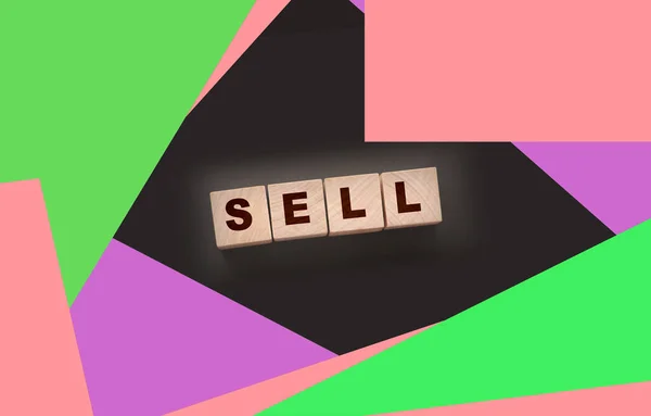 带有单词的木制立方体在黑暗的背景下出售 购物概念 — 图库照片