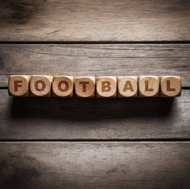 Tahta arka planda futbol topu