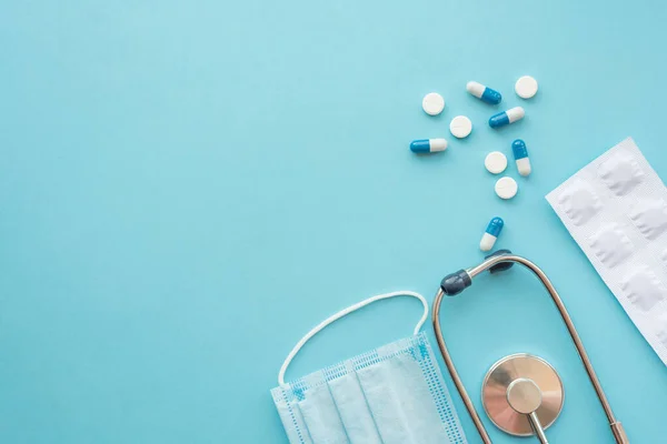 Pharmaceutical Medicine Tablets Stethoscope Blue Background Face Mask Surgical Mask Стоковое Изображение