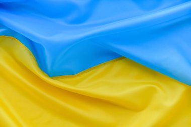 Ukrainian flag. The background is yellow, blue.
