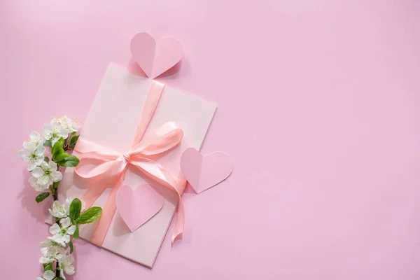 stock image Spring bouquet of flowers on a pink background.