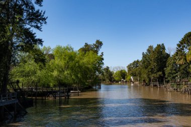 A view of traditional islands at Tigre delta in Argentina, river system of the Parana Delta North from capital Buenos Aires. clipart