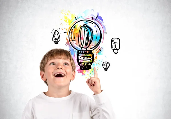 Impressed Child Boy Happy Look Finger Pointing Bright Light Bulb — Stock Photo, Image