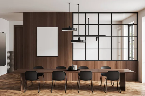 Stylish meeting room interior with long table and chairs. Dining area with panoramic window and glass wall partition, hardwood floor. Mock up canvas poster. 3D rendering