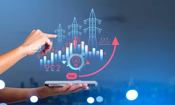Businesswoman holding smartphone with hologram of power lines, bar and pie diagrams, candlesticks. Concept of troubleshooting of worldwide electricity energy crisis, power resources deficit, trading