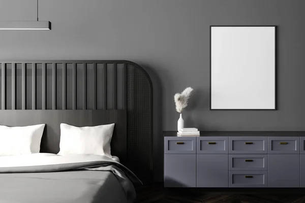 Dark bedroom interior bed and dresser with minimalist decoration, grey beddings and lamp. Mock up canvas poster. 3D rendering