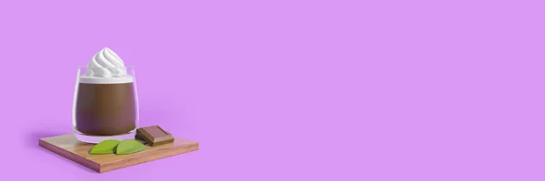 stock image Hot cocoa with whipped cream and chocolate bar on a wooden tray, long banner with empty copy space purple background. Concept of drink and coffee. 3D rendering