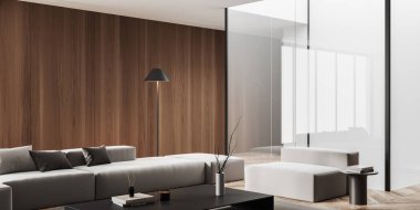 Wooden living room interior with sofa and armchair, side view soft place with coffee table and glass partition on hardwood floor. 3D rendering