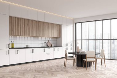 Light kitchen interior with dining table and chairs, side view hardwood floor. Cooking corner with shelves and kitchenware, panoramic window on skyscrapers. 3D rendering