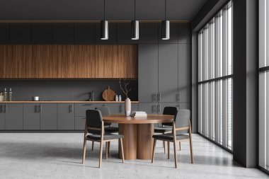 Front view on dark kitchen room interior with dining table with armchairs, panoramic window, grey wall, concrete floor, cupboard. Concept of minimalist design. 3d rendering