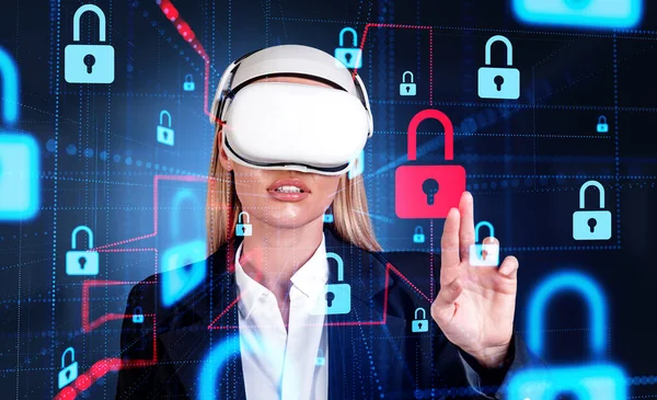 Businesswoman in vr glasses, virtual screen with digital cybersecurity hud hologram with glowing locks. Red padlock, concept of cyberattack in metaverse